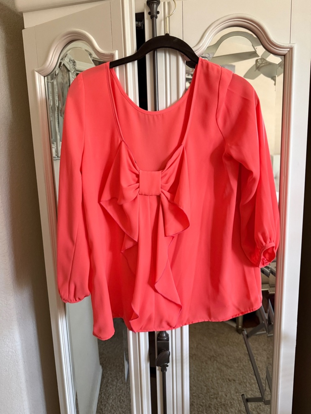 Necessary Clothing Coral Bow-Front Blouse